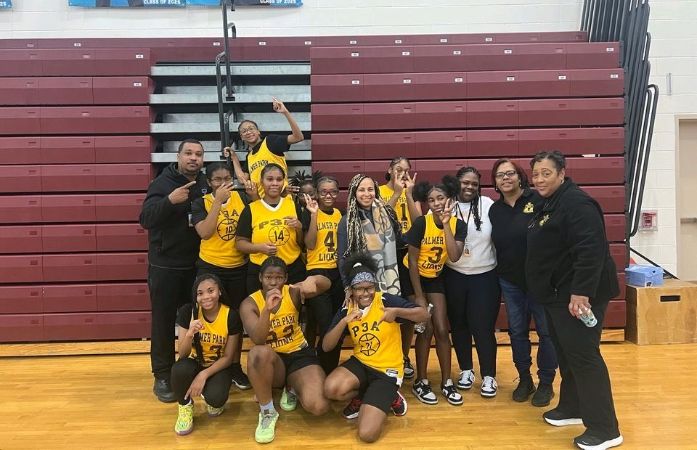  Palmer Park Girls Basketball Team Poses with Coaches and Principal